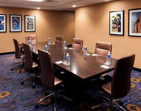 Conference meeting room with boardroom table at Courtyard By Marriott Houston North/Shenandoah.
