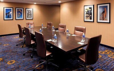 Conference meeting room with boardroom table at Courtyard By Marriott Houston North/Shenandoah.