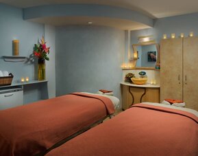 Relaxing spa treatment room at Courtyard Waikiki Beach.