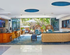 Contemporary seating and lounge area at Courtyard Waikiki Beach.