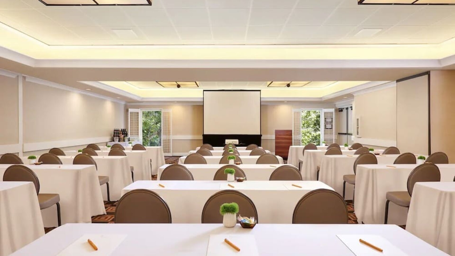 Flexible meeting and event space at The Garland arranged in classroom style for conferences, presentations, and business gatherings.