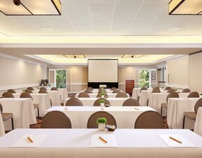 Flexible meeting and event space at The Garland arranged in classroom style for conferences, presentations, and business gatherings.