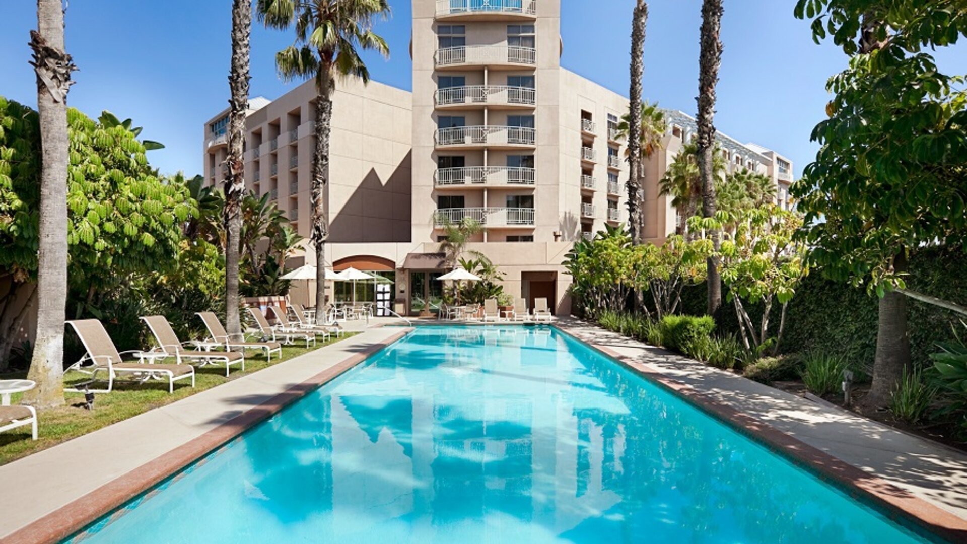 Refreshing outdoor pool at Embassy Suites By Hilton Brea North Orange County.