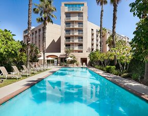 Refreshing outdoor pool at Embassy Suites By Hilton Brea North Orange County.
