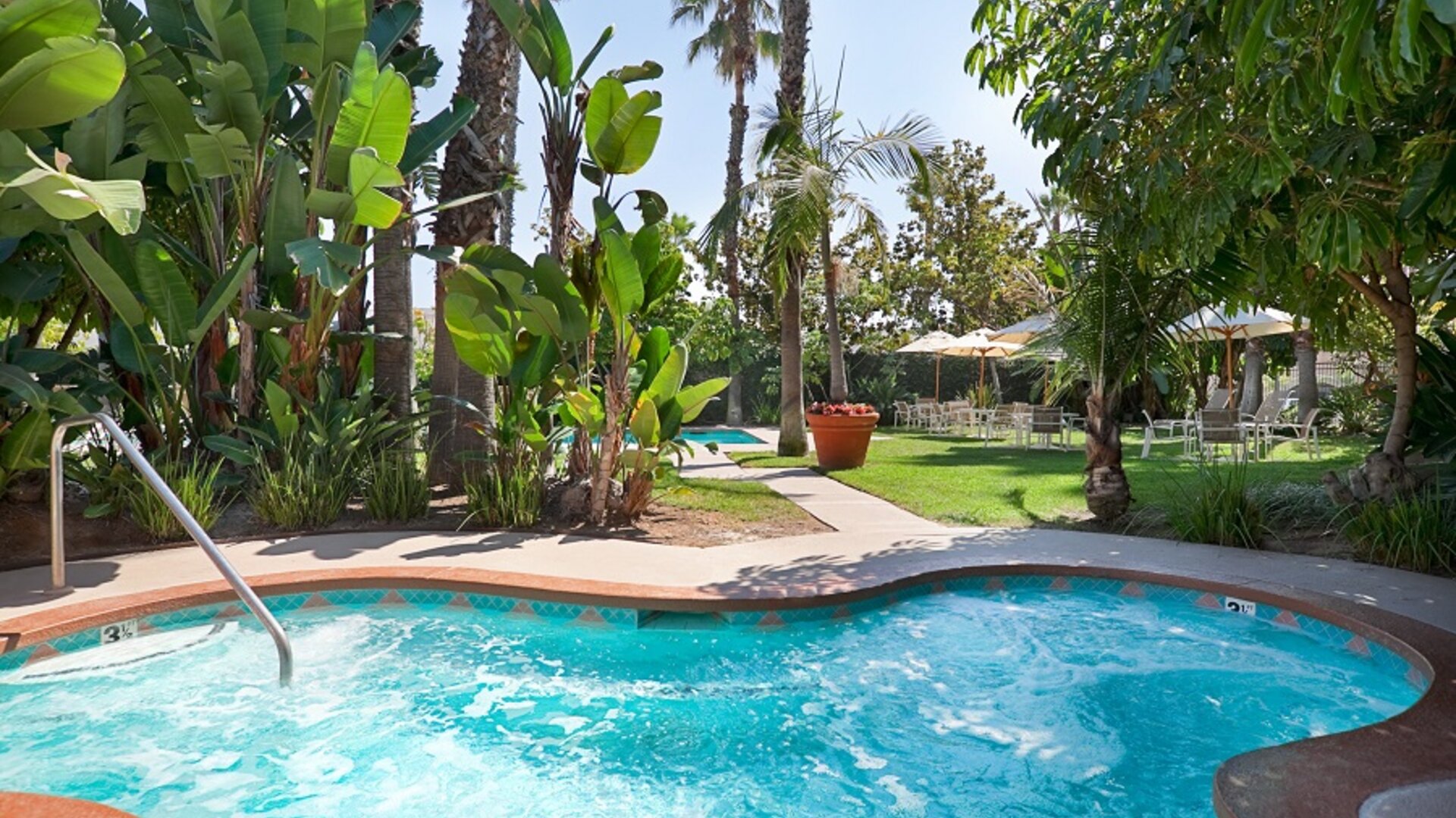 Refreshing outdoor pool at Embassy Suites By Hilton Brea North Orange County.