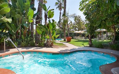 Refreshing outdoor pool at Embassy Suites By Hilton Brea North Orange County.