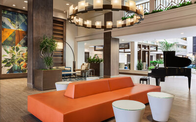 Lobby and coworking lounge at Embassy Suites By Hilton Brea North Orange County.