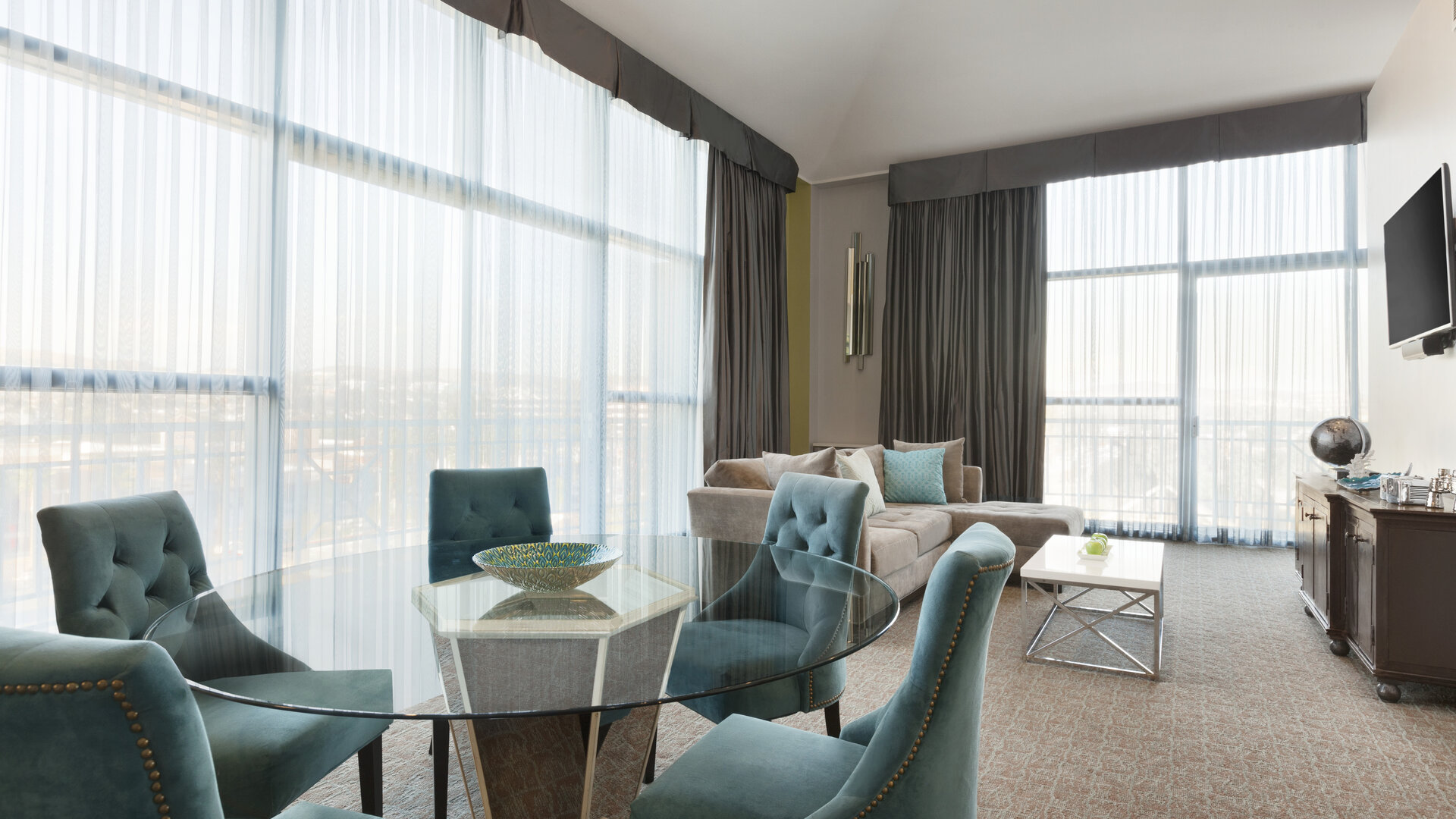 Living area inside day use room at Embassy Suites By Hilton Brea North Orange County.