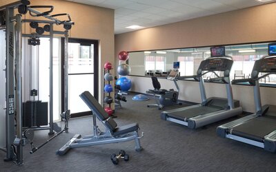 Fully equipped fitness center at Courtyard By Marriott Toronto Airport.