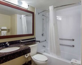 Guest bathroom with shower and tub at Comfort Inn Sandy Springs - Perimeter.