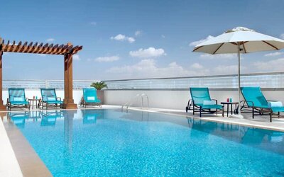 Beautiful outdoor pool at the Hilton Garden Inn Dubai Al Muraqabat