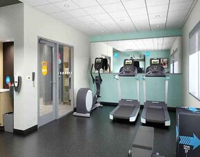 Well-equipped indoor fitness center at Tru by Hilton Edinburg.