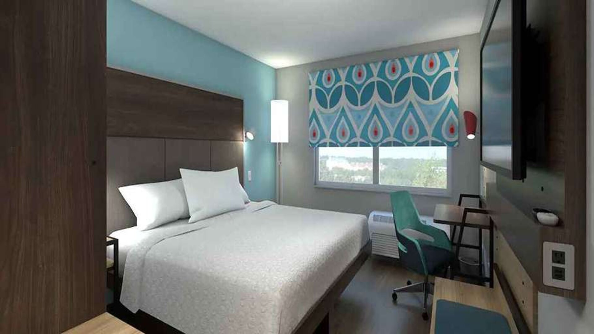 Delux king bed with work desk at Tru by Hilton Edinburg.