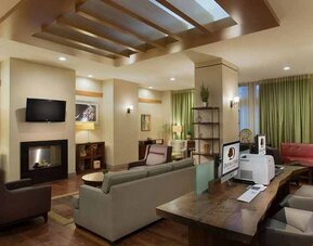 comfortable lounge and workdesk with online facilities at DoubleTree by Hilton Los Angeles - Norwalk.
