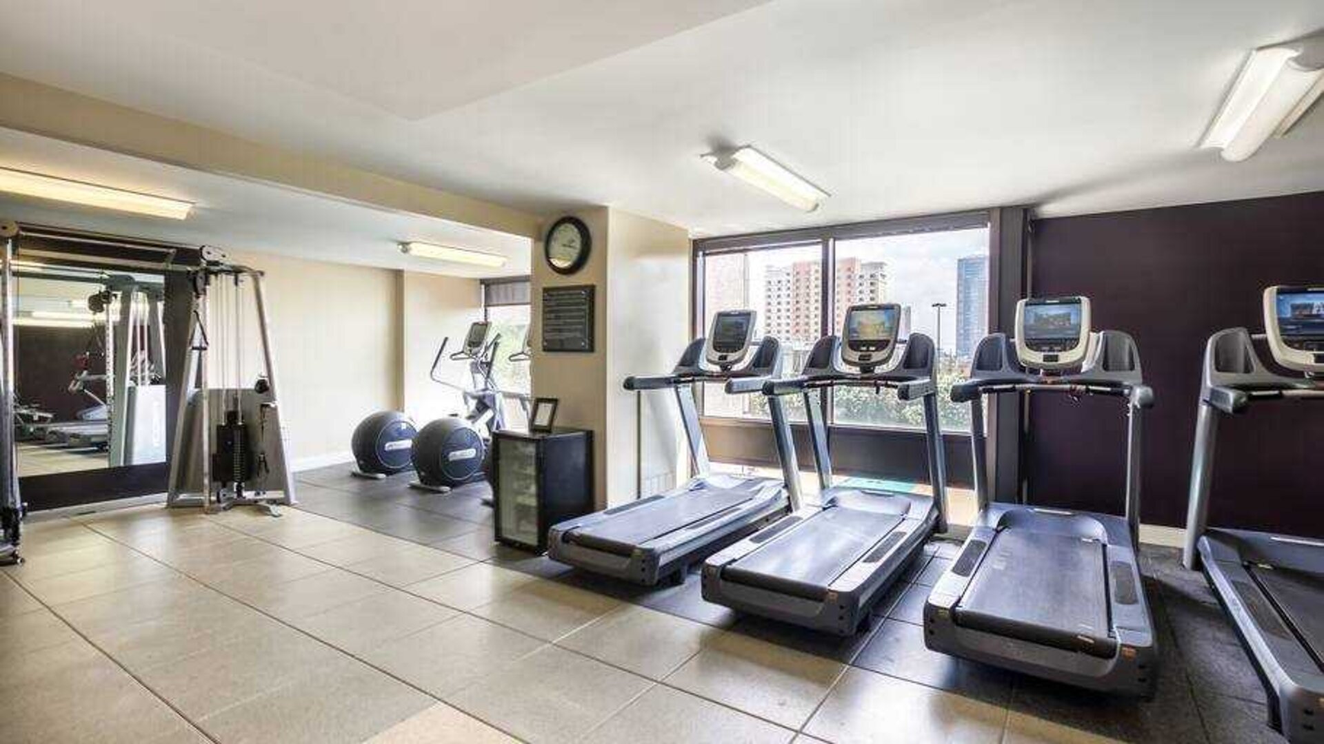 Fitness center with treadmills at the DoubleTree Suites by Hilton Houston by the Galleria.