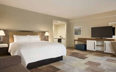 Comfortable king suite with work area at Hampton Inn By Hilton, Salt Lake City Cottonwood.