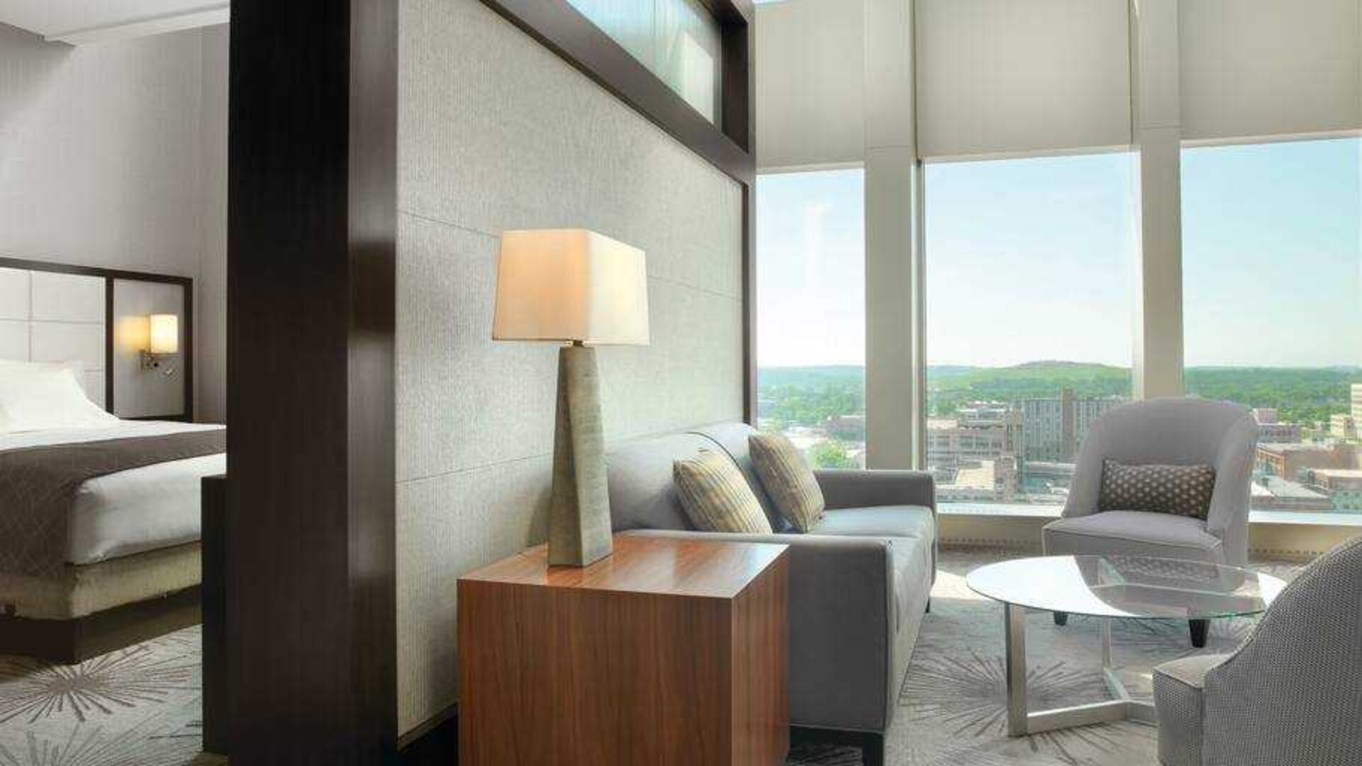 Spacious living room in a king suite room at the DoubleTree by Hilton Cedar Rapids Convention Complex.