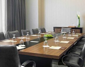 Meeting room with square table at the DoubleTree by Hilton Cedar Rapids Convention Complex.