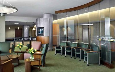 Beautiful lobby area with lounges and chairs perfect as workspace at the DoubleTree by Hilton Omaha-Downtown.