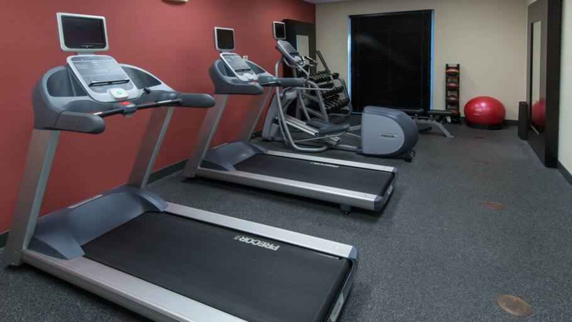 Fitness center with treadmills at the Hilton Garden Inn Tallahassee Central.