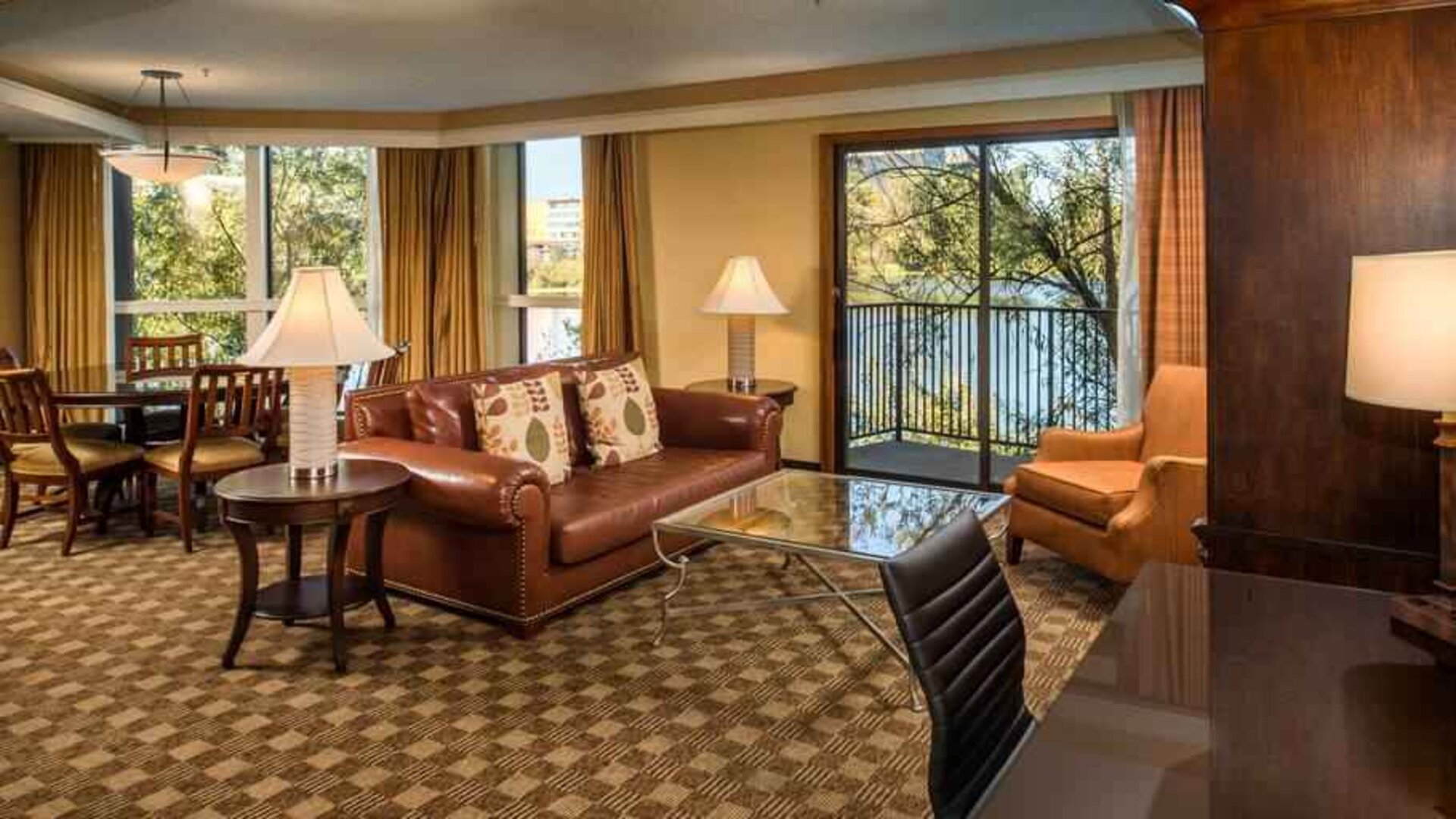 Spacious living room with working station at the DoubleTree by Hilton Seattle Airport.