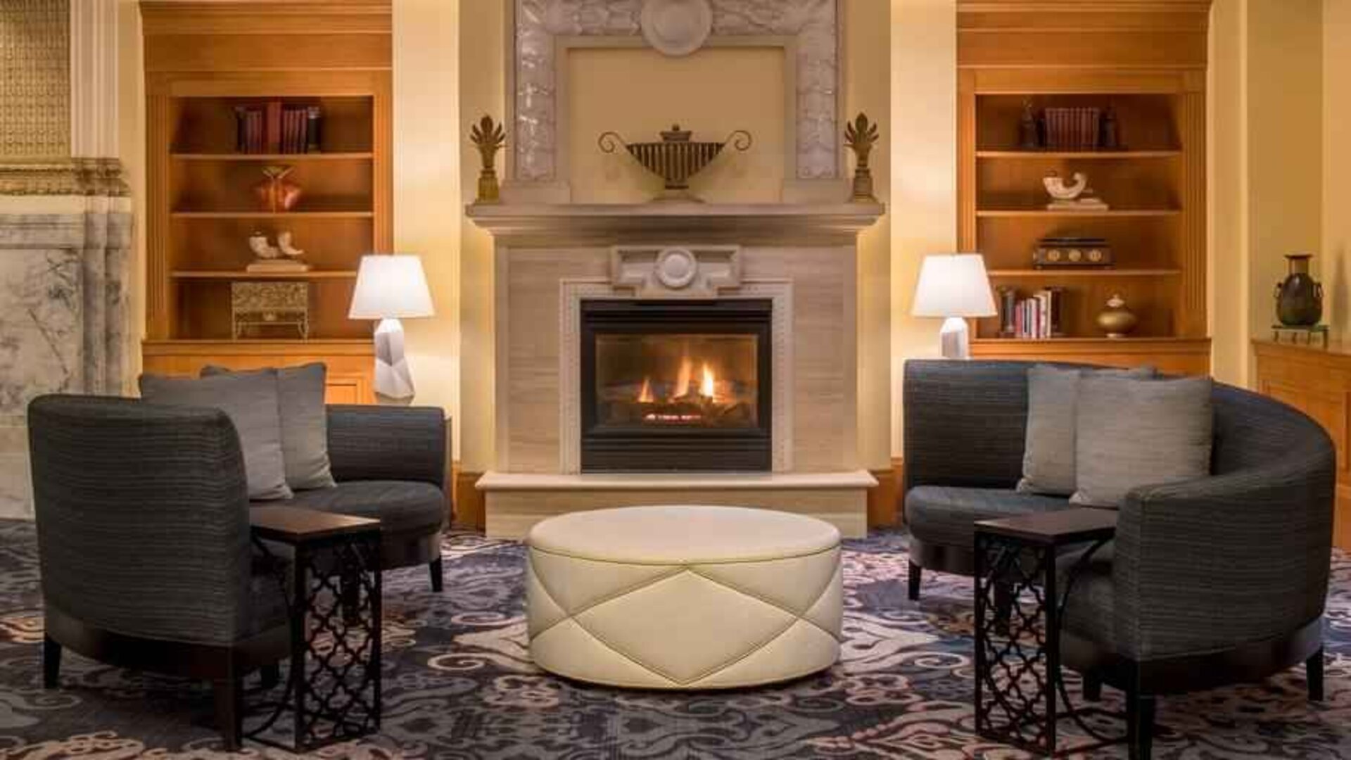 Comfortable workspace by the fireplace at the Embassy Suites by Hilton Portland-Downtown.