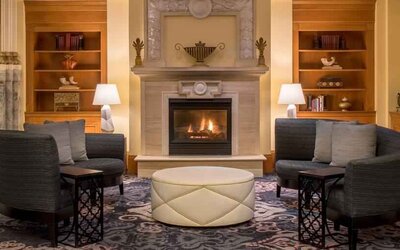 Comfortable workspace by the fireplace at the Embassy Suites by Hilton Portland-Downtown.