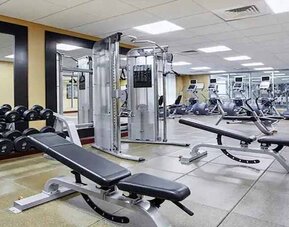 well-equipped fitness center at Homewood Suites by Hilton Rockville-Gaithersburg.