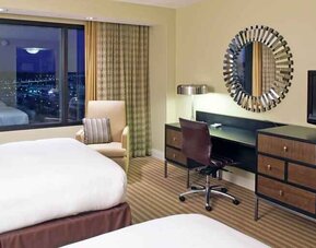 Working station in a double queen room at the Hilton Omaha.