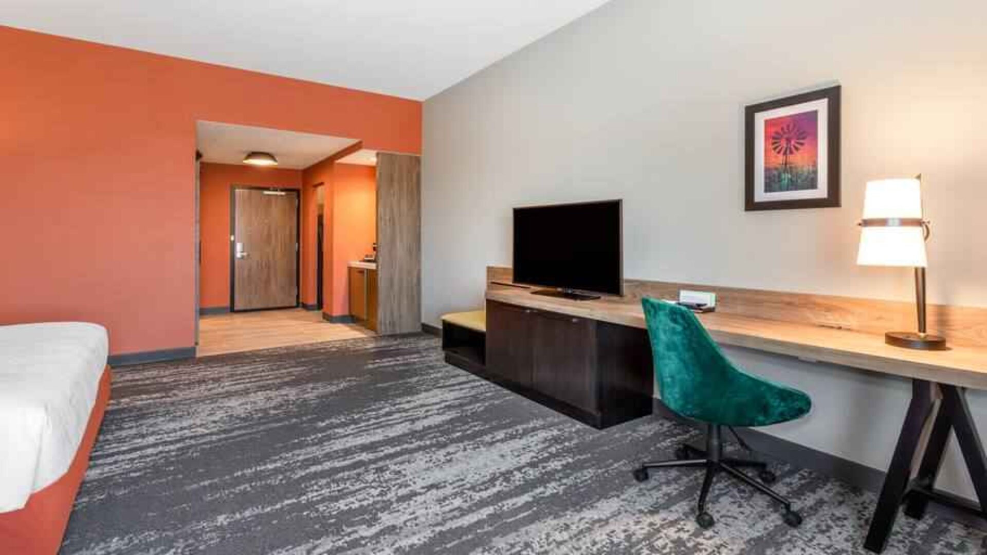 Comfortable working station with desk in a hotel room at the Hilton Garden Inn Hays.