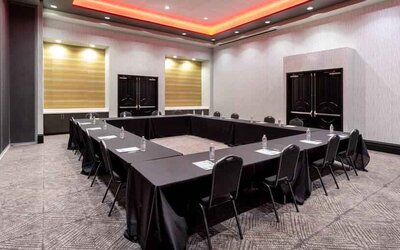Meeting room with square table at the Hilton Garden Inn Hays.
