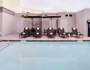 Relaxing indoor pool at the Hampton Inn & Suites by Hilton-Irvine/Orange County Airport.