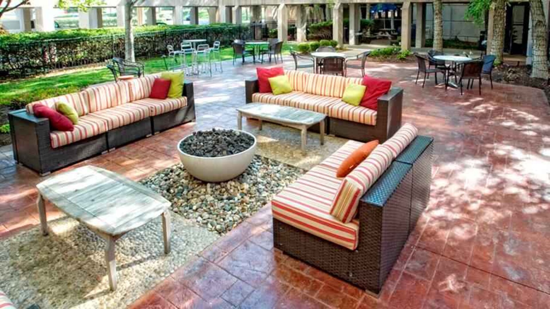 Beautiful outdoor patio with garden perfect as workspace at the DoubleTree by Hilton Kansas City - Overland Park.
