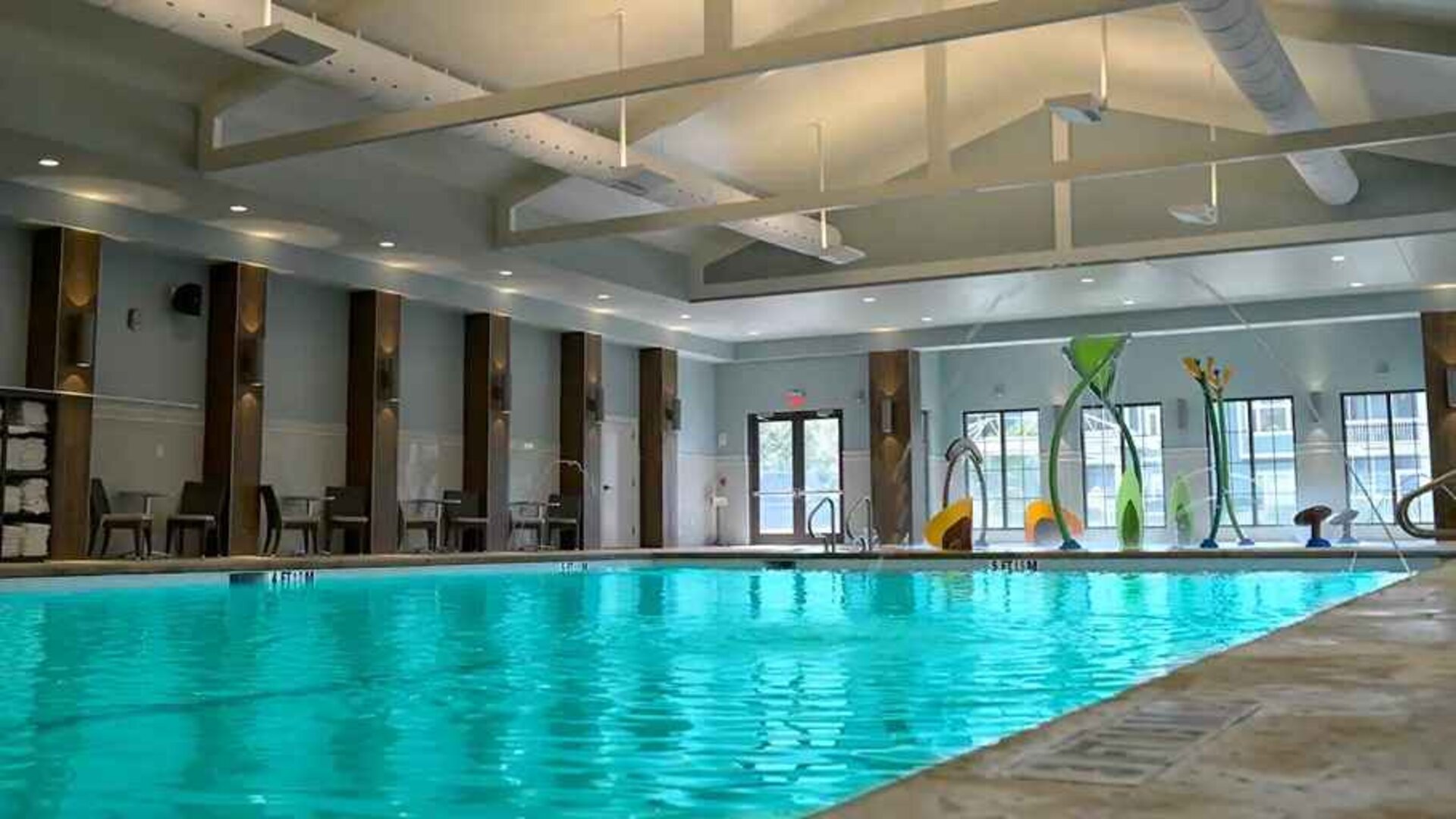 beautiful indoor pool with seating area at Hilton Myrtle Beach Resort.