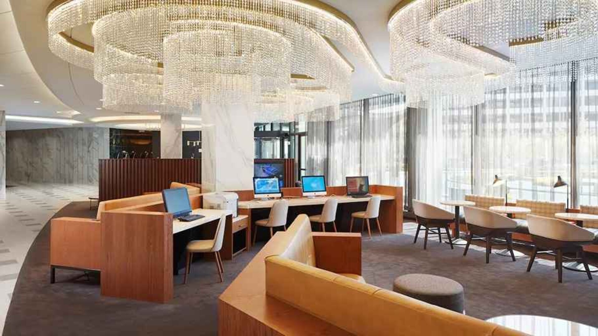 spacious and well-lit coworking space and business center ideal for remote working at Washington Hilton.