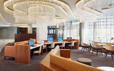 spacious and well-lit coworking space and business center ideal for remote working at Washington Hilton.