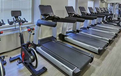 Well-equipped fitness center at Hilton Milwaukee City Center.