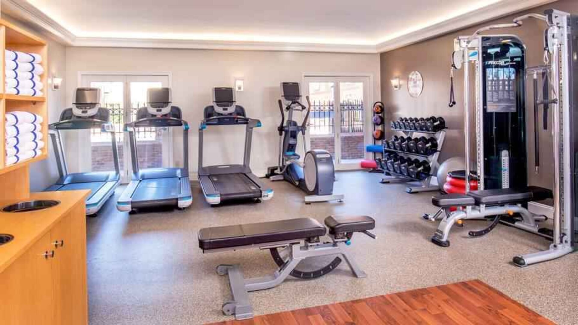 Fitness center with treadmills and weights at the Hilton Wilmington-Christiana.