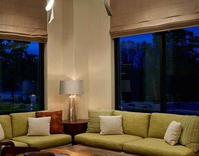Comfortable lobby lounge area ideal for coworking at Hilton Garden Inn Boston/Marlborough.