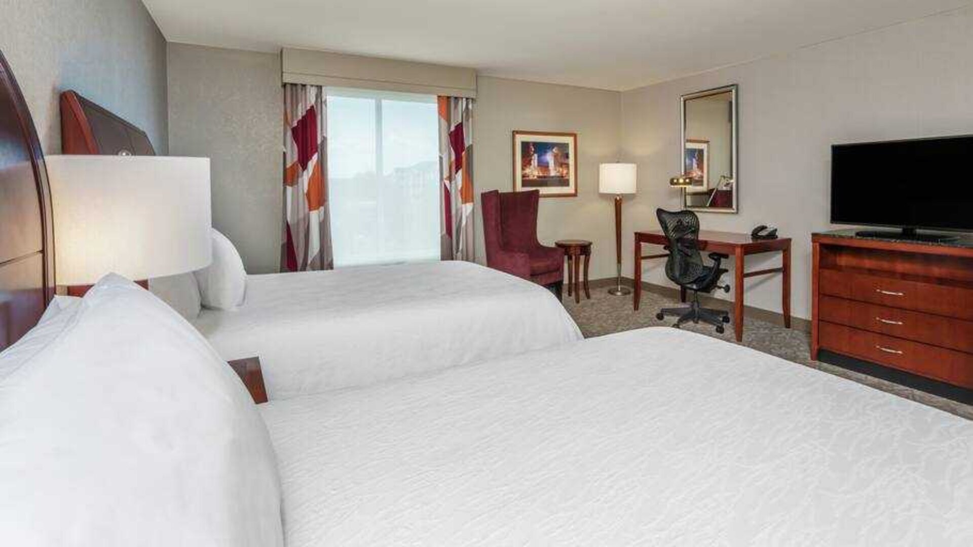 Double queen room with working station at the Hilton Garden Inn Blacksburg University.