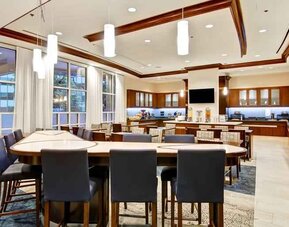 Large restaurant area perfect as workspace at the Homewood Suites by Hilton Washington, D.C. Downtown.