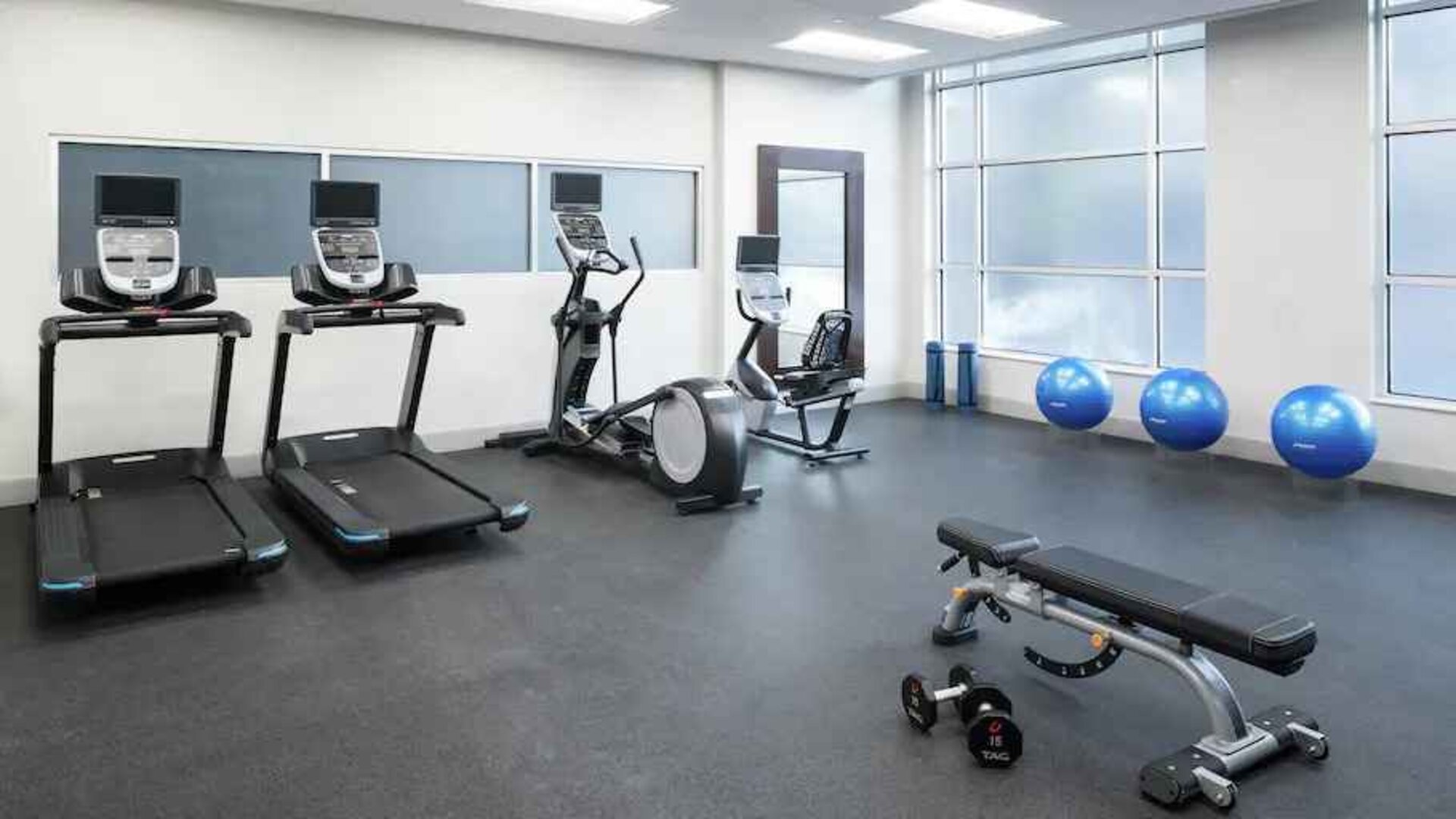 Fitness center with treadmills at the Hampton Inn & Suites Memphis-Beale Street.