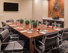 Small meeting room with conference table at the DoubleTree by Hilton Lafayette East.