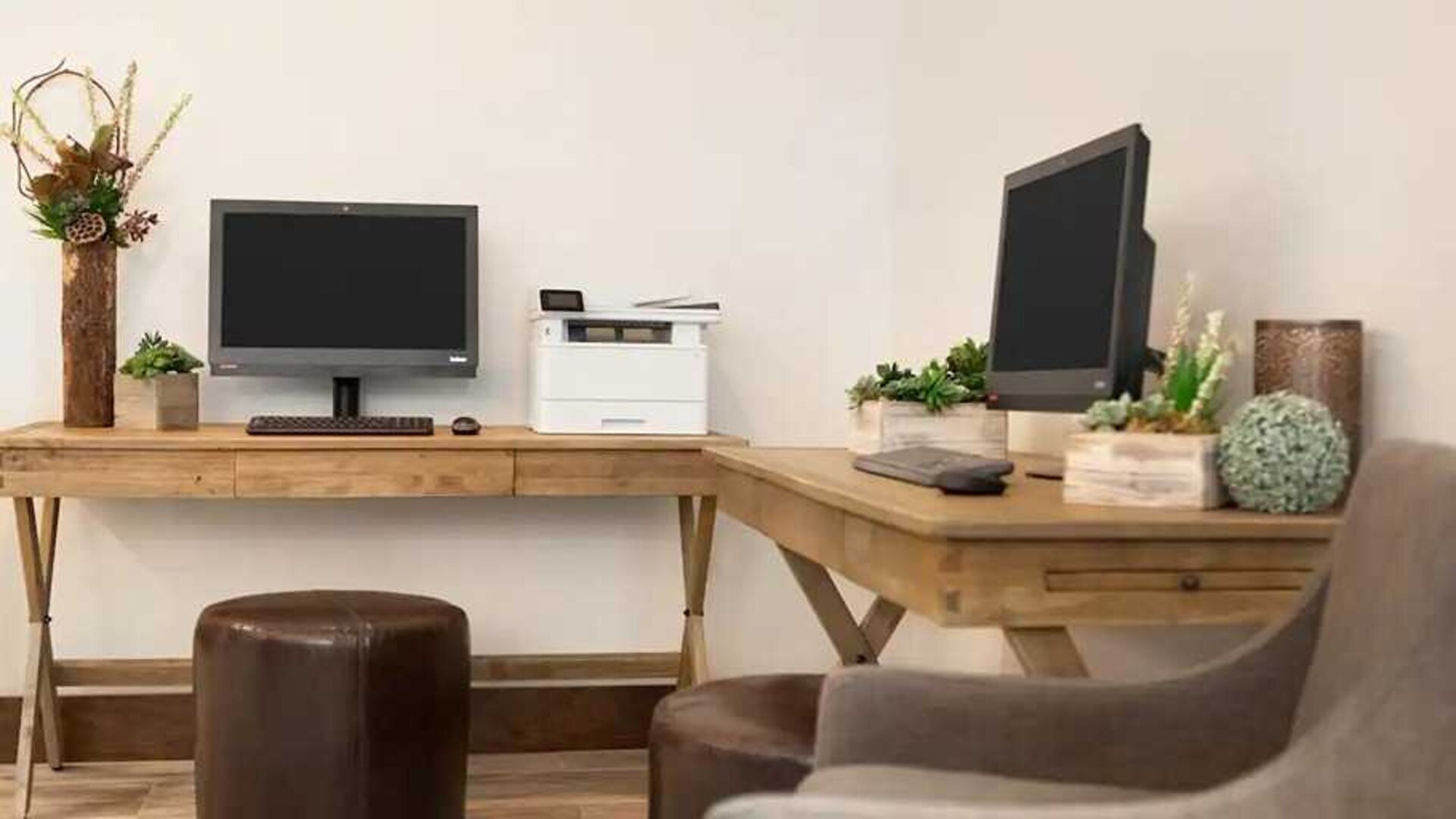 dedicated business center with printers, internet, and work desks ideal for working remotely at Embassy Suites by Hilton Boulder.