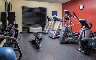 Fitness center with treadmills and machines at the Hampton Inn Albuquerque, University-Midtown (UNM).