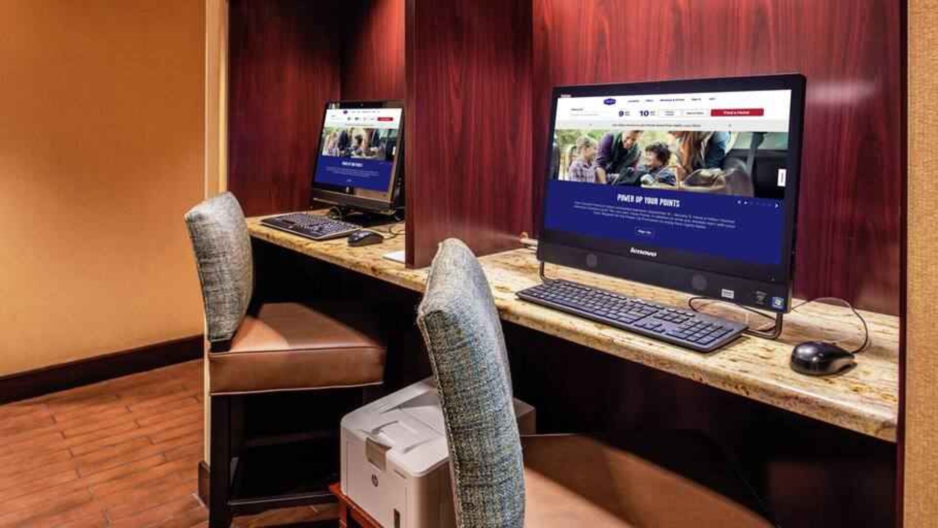 Working station with computers and printer at the Hampton Inn Albuquerque, University-Midtown (UNM).