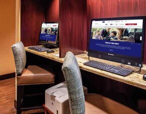 Working station with computers and printer at the Hampton Inn Albuquerque, University-Midtown (UNM).