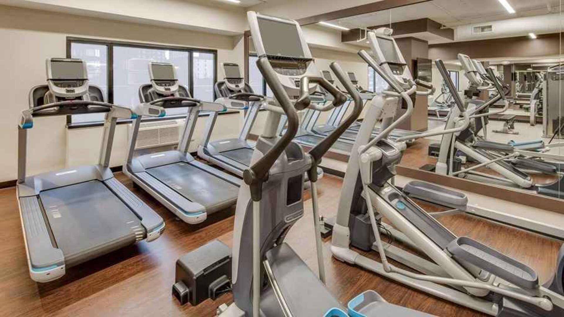 fully equipped fitness center at DoubleTree by Hilton Hotel & Suites Jersey City.