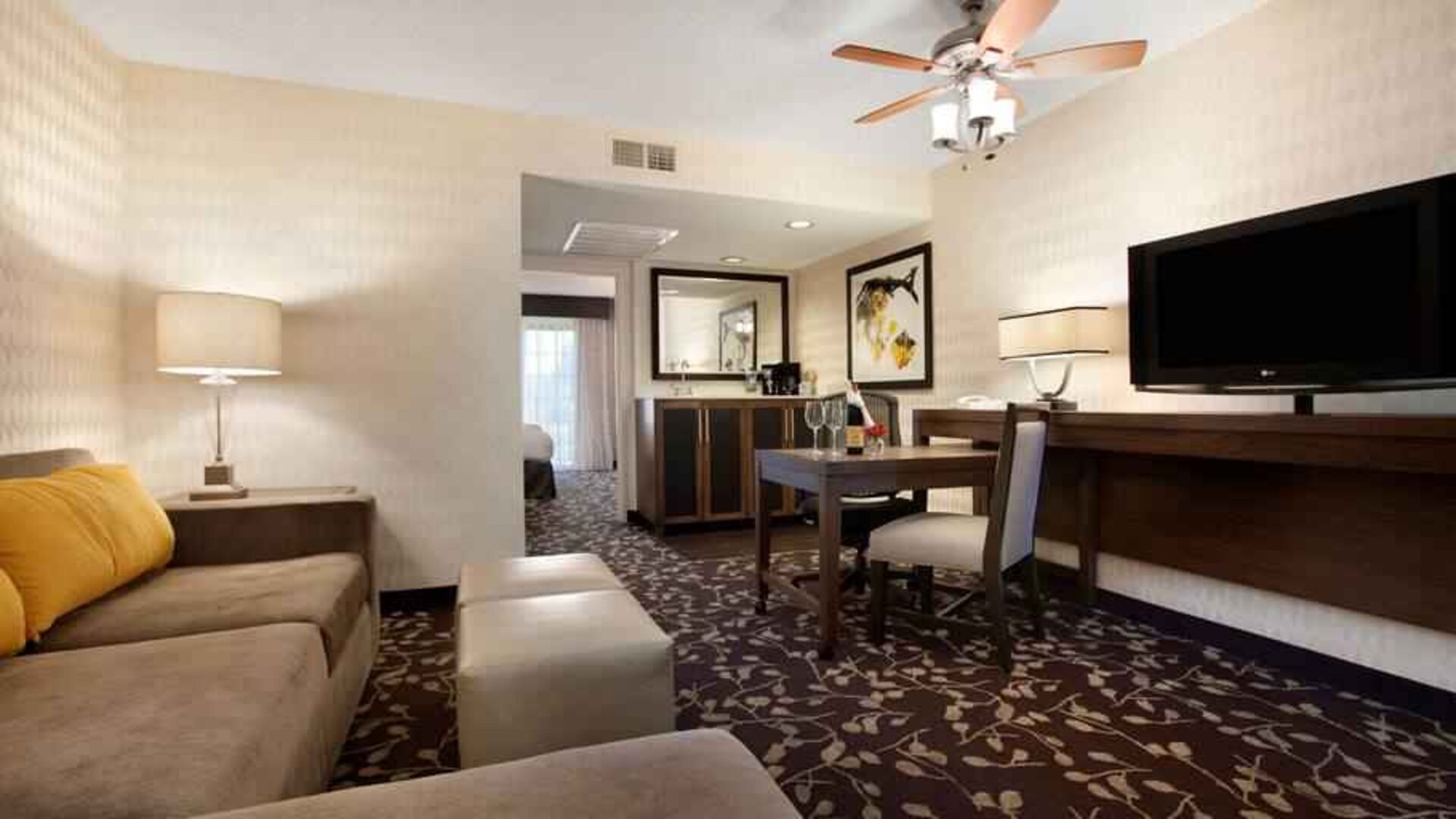 Living room in a hotel suite perfect as workspace at the Embassy Suites by Hilton Napa Valley.