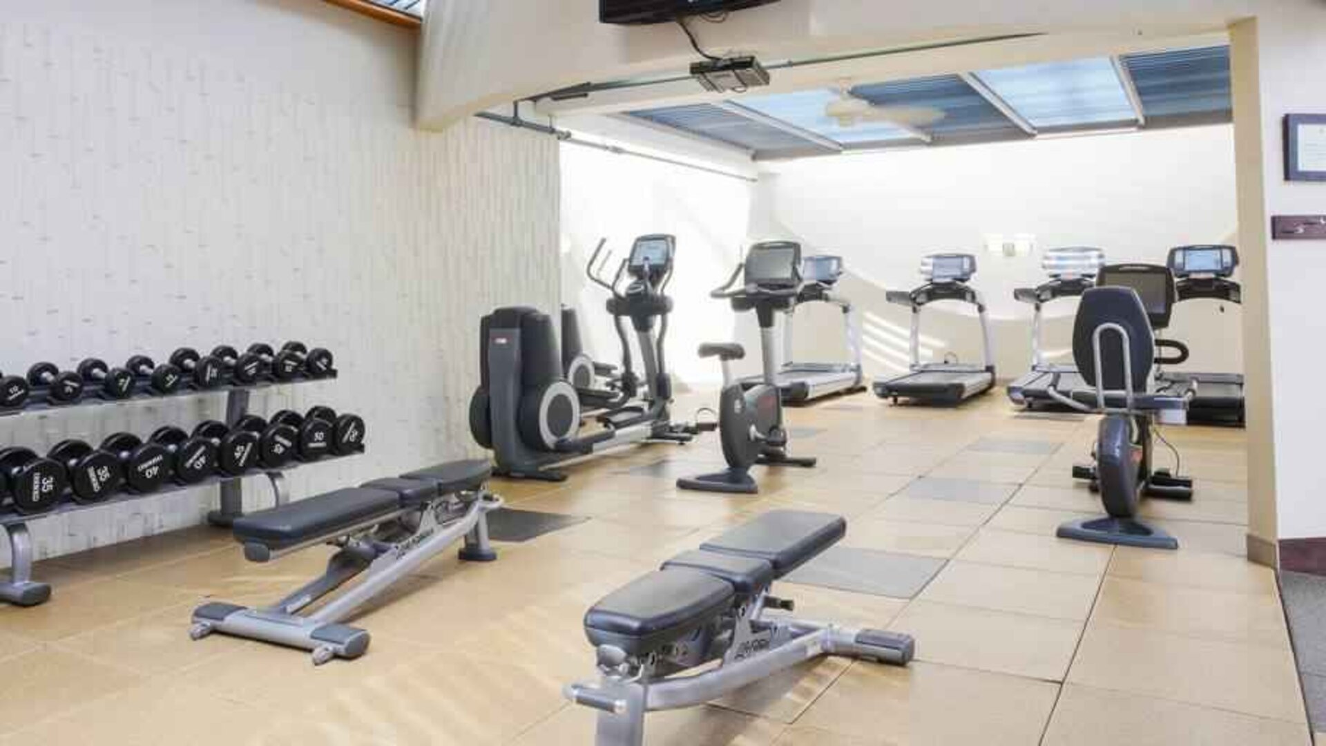 Fully equipped fitness center at the DoubleTree by Hilton Rochester.